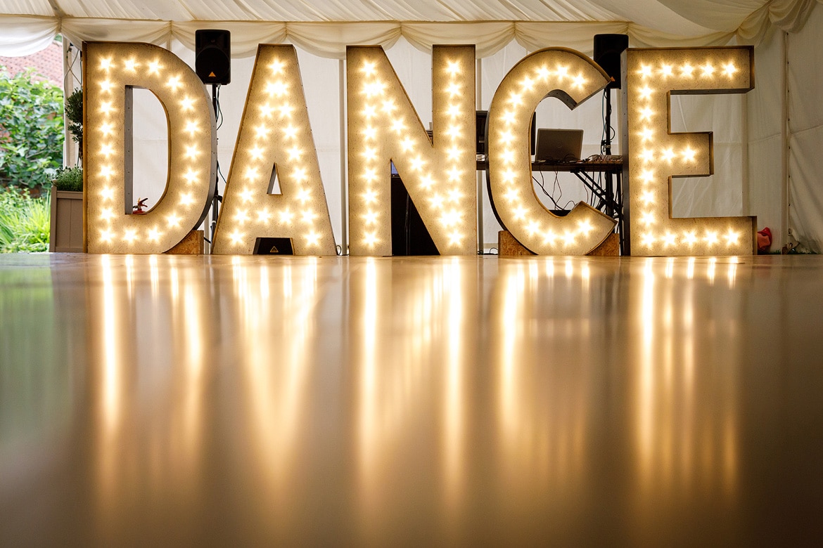 huge dance sign made by the groom