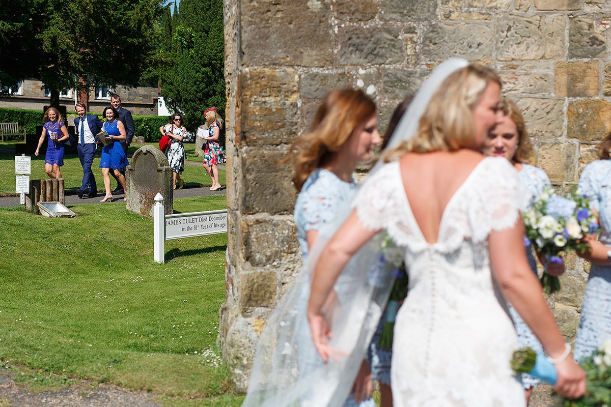 guests walk to greet the couple