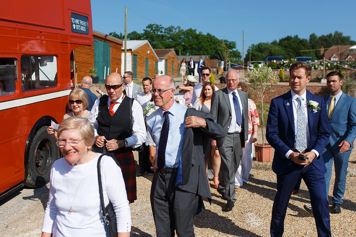 the guests arrive on their routemaster bus