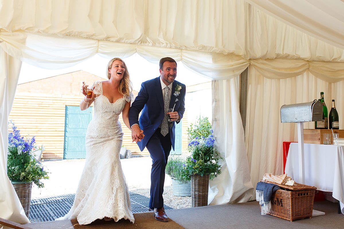 laura and todd enter the wedding breakfast