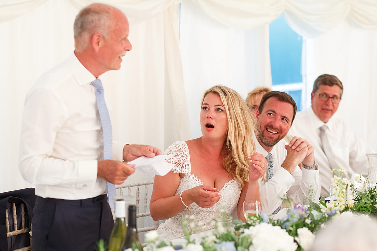 the father of the bride cracks a joke during his speech