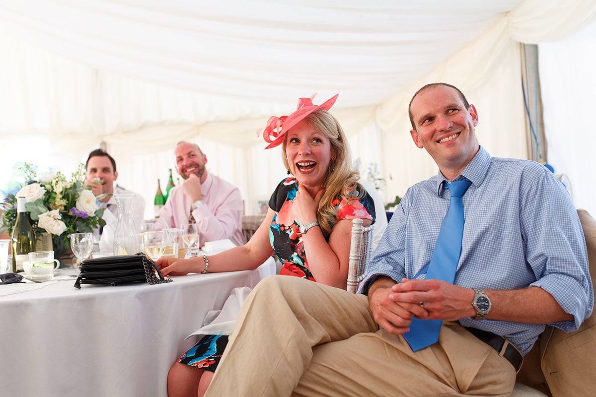 guests laughing during the speeches