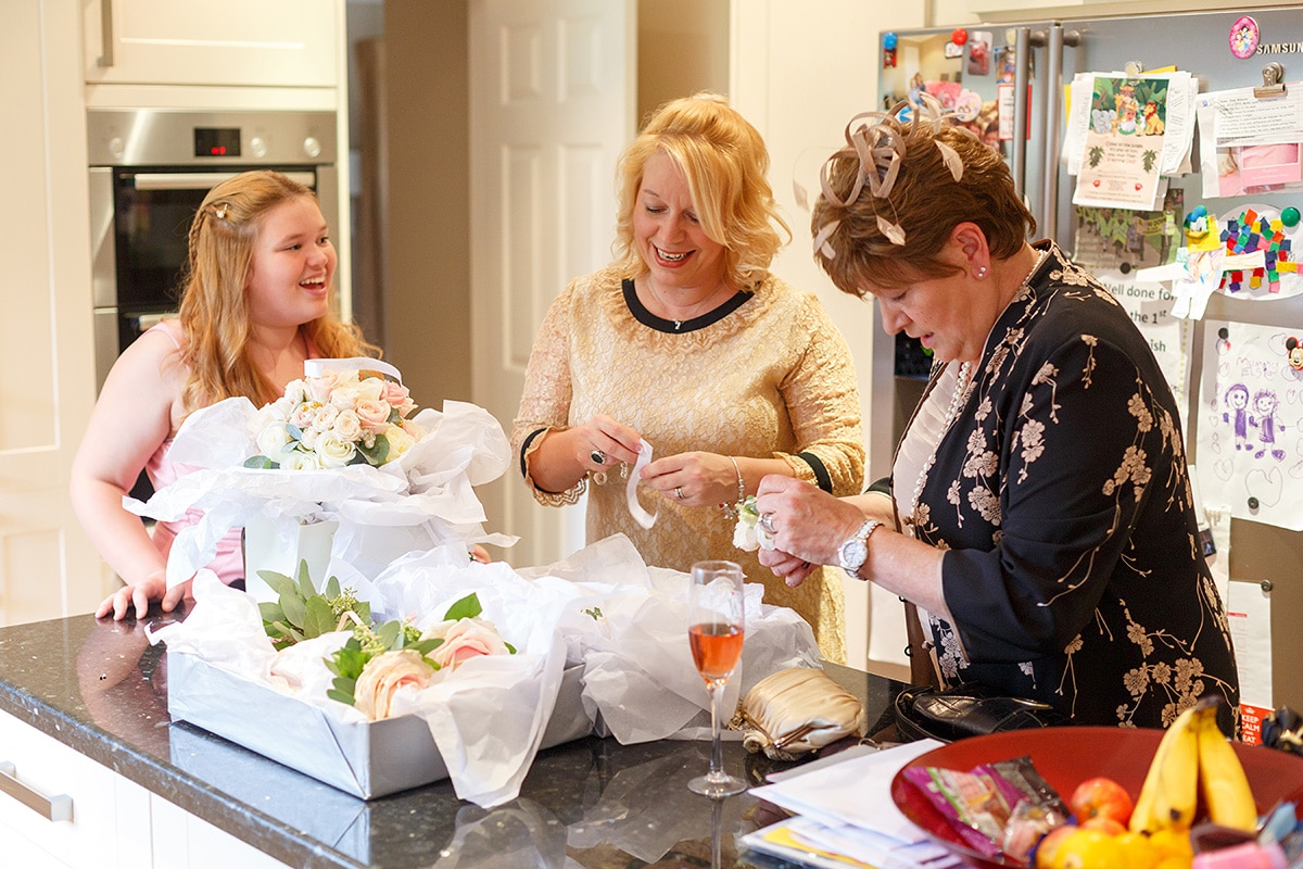 the brides mother fixeds the wedding flowers