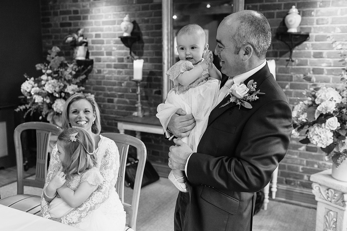 the groom and his daughter during the ceremony