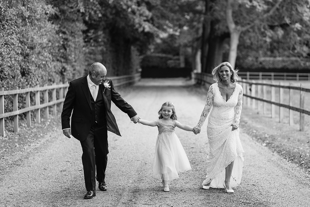 kelly and steve and their daughter on brasteds driveway