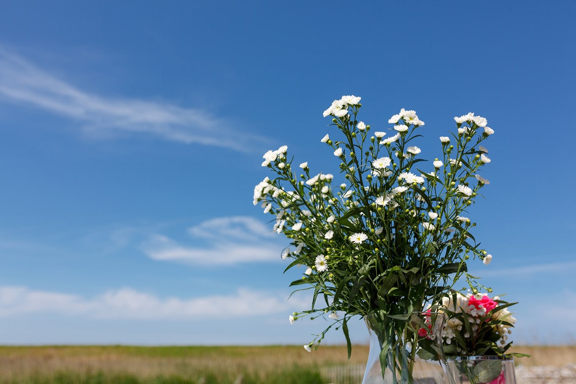 wedding flowers under a clear blue sky