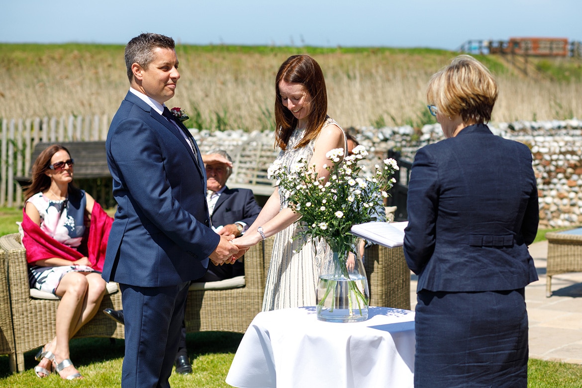 a wedding ceremony on the north norfolk coast