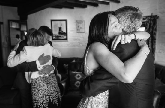 hugs after a cley windmill wedding ceremony
