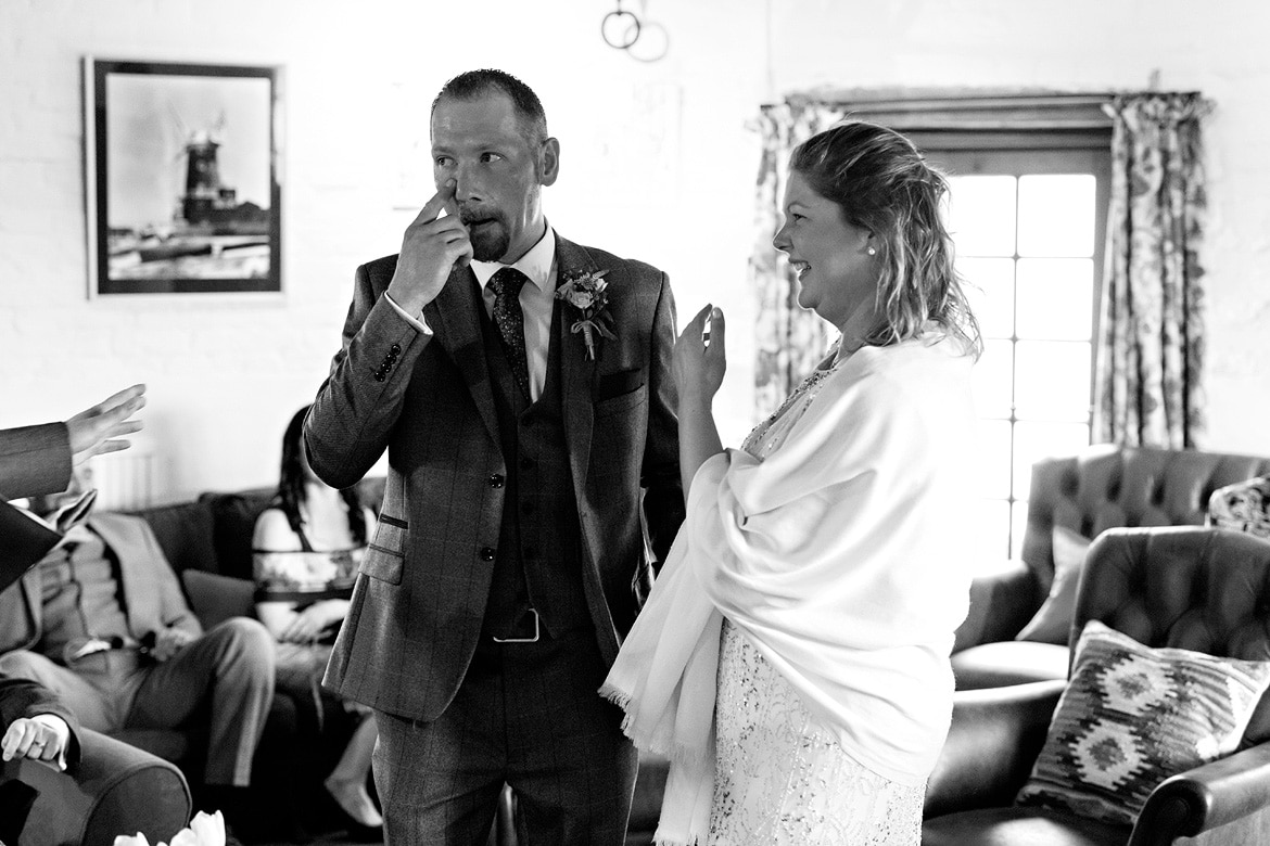 a brief tear during a cley windmill wedding