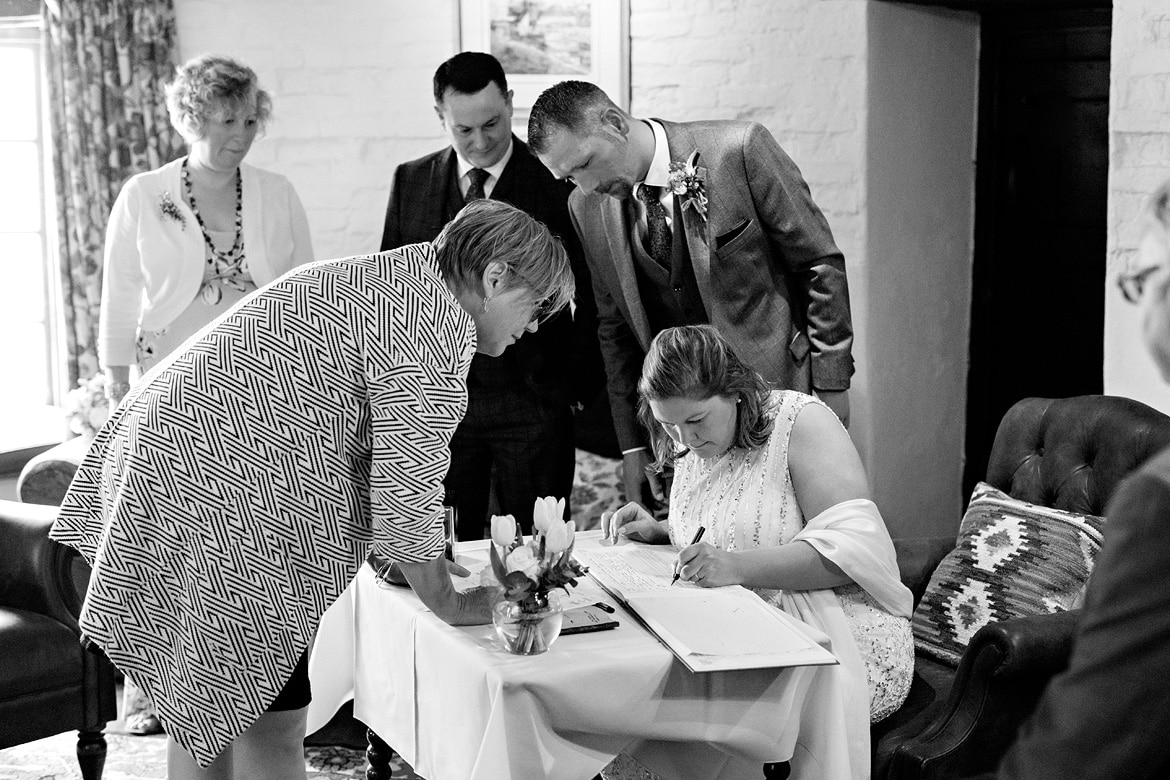 signing the register at a north norfolk wedding