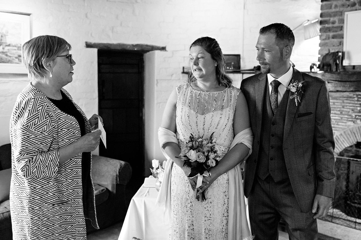 handing over the marriage certificate