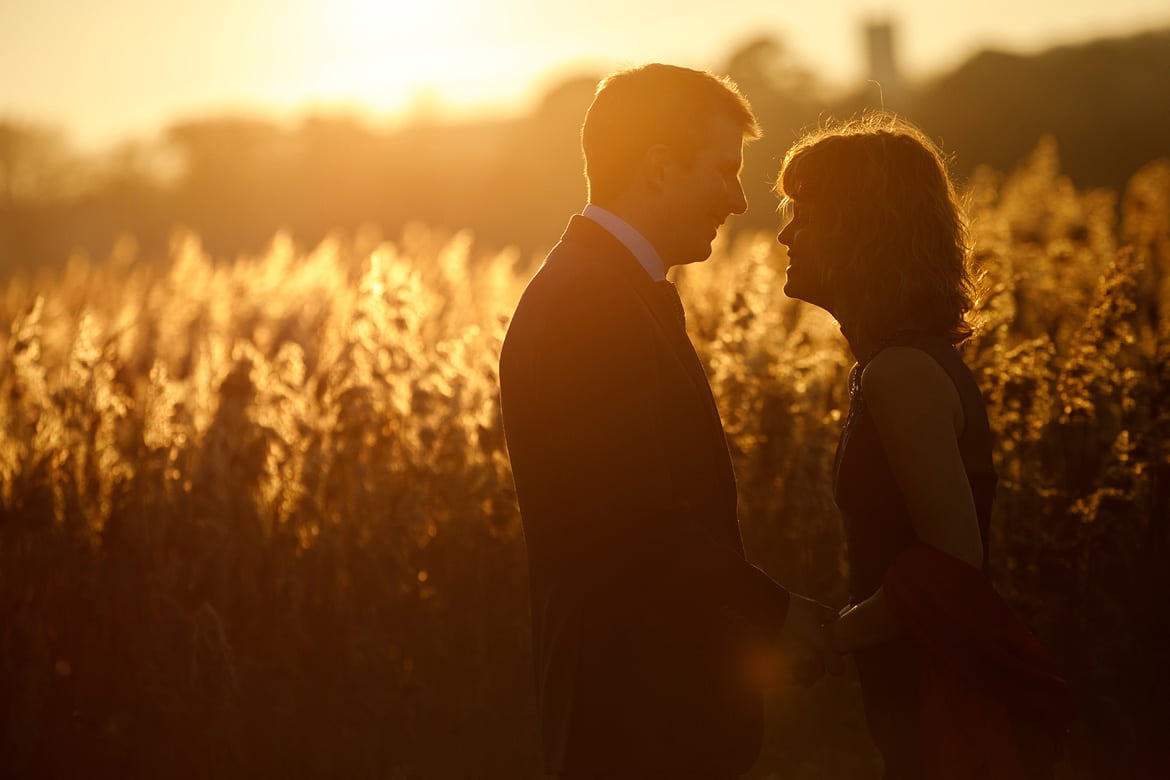 a winter wedding portrait with the marshes in the background