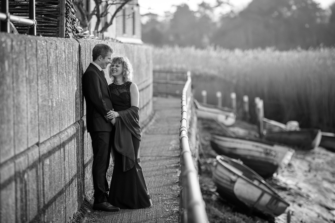 bride and groom on the norfolk coastal path