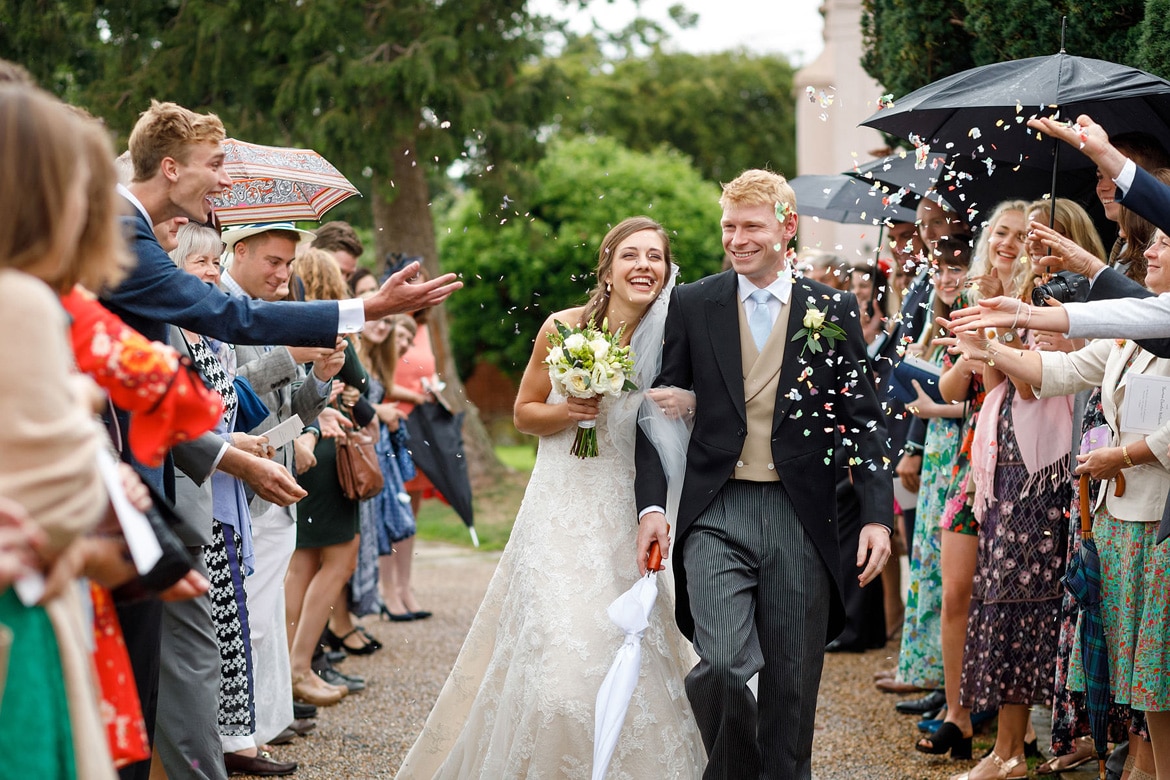 tom an anna walk through the confetti