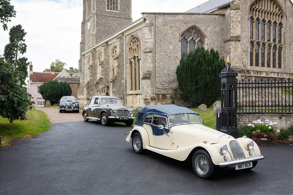 the wedding cars leaving framlingham church