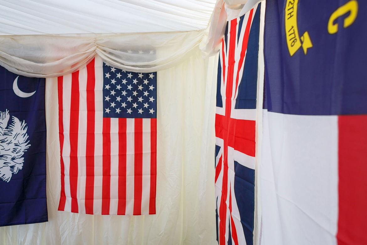 flags hanging inside a suffolk wedding marquee