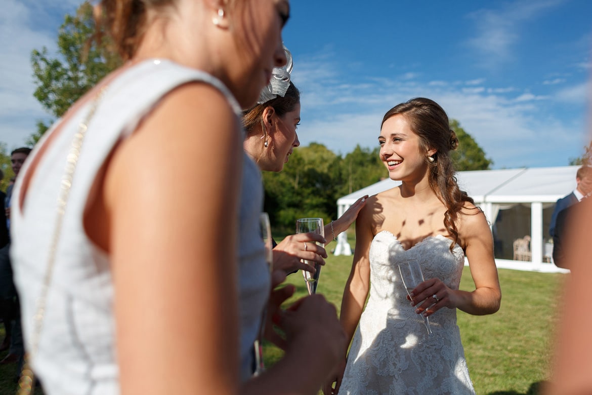 guests talk to the bride