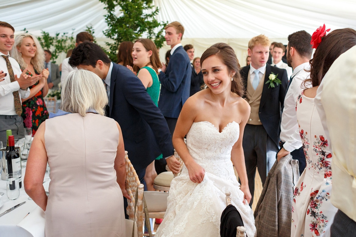 the bride is greeted by guests