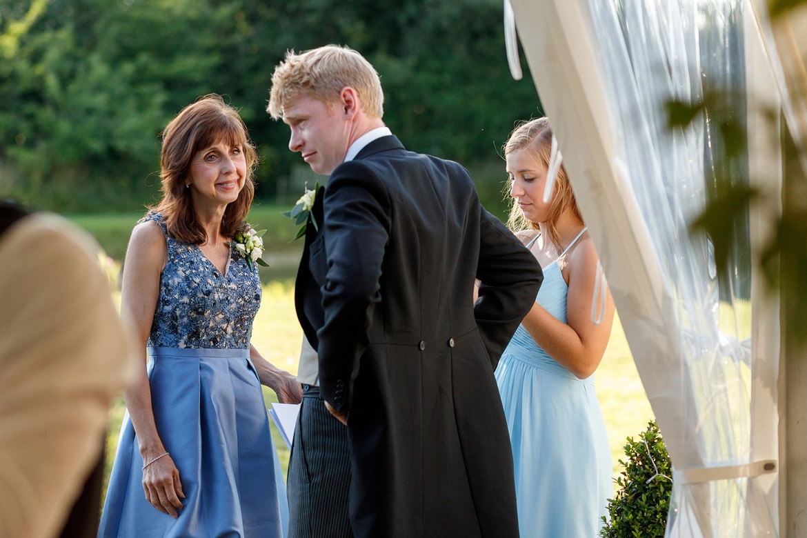 the groom talks to the bride's mother 