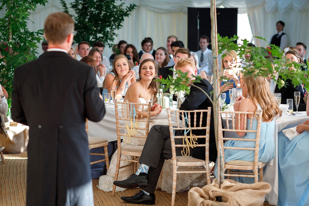 the bride smiles at her father