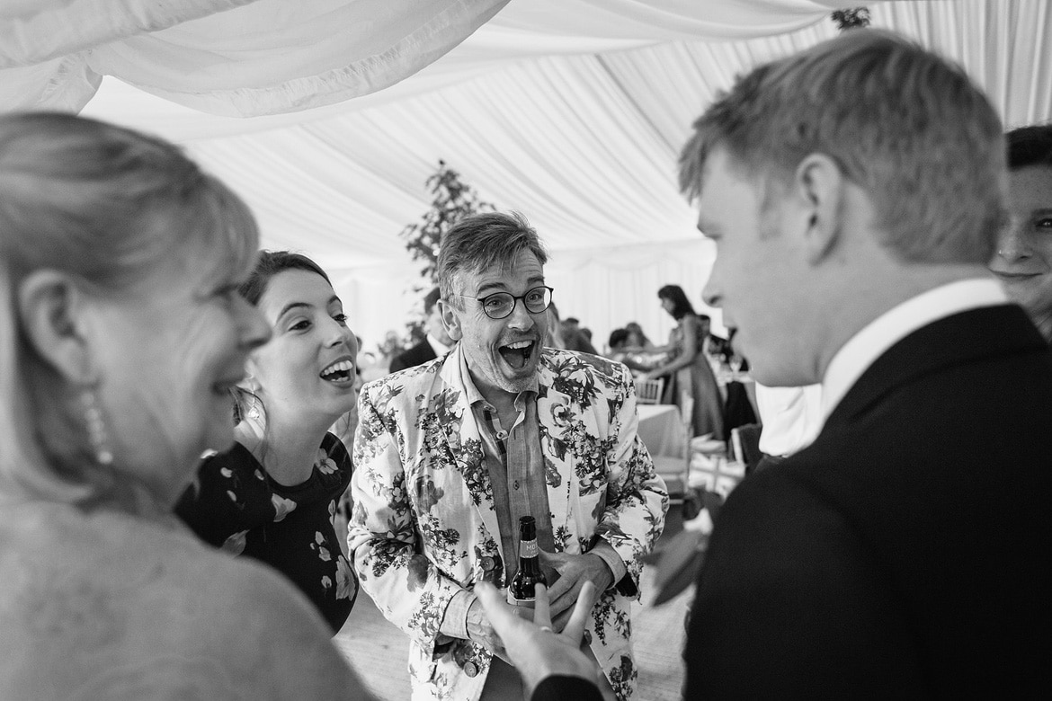 evening guests arrive at a suffolk summer wedding