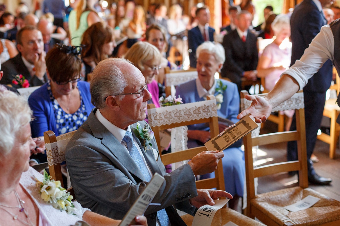 the grooms father looks on