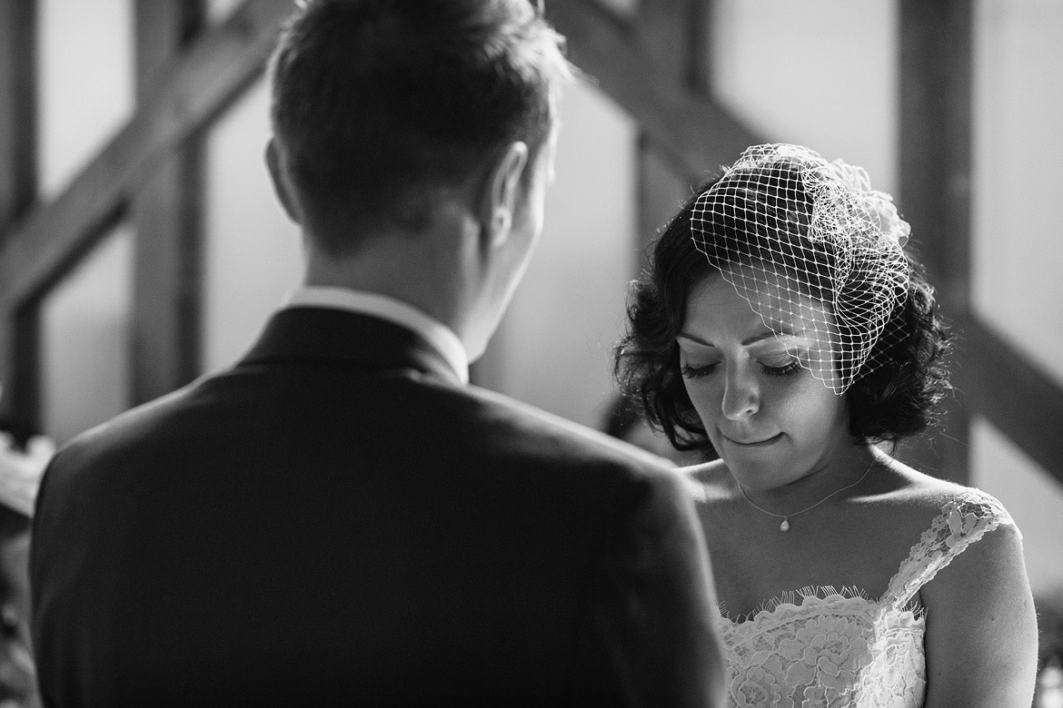 a quiet moment during a gate street barn wedding ceremony