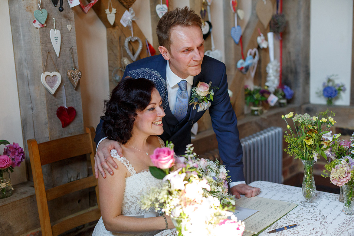 posing with the register for the guests