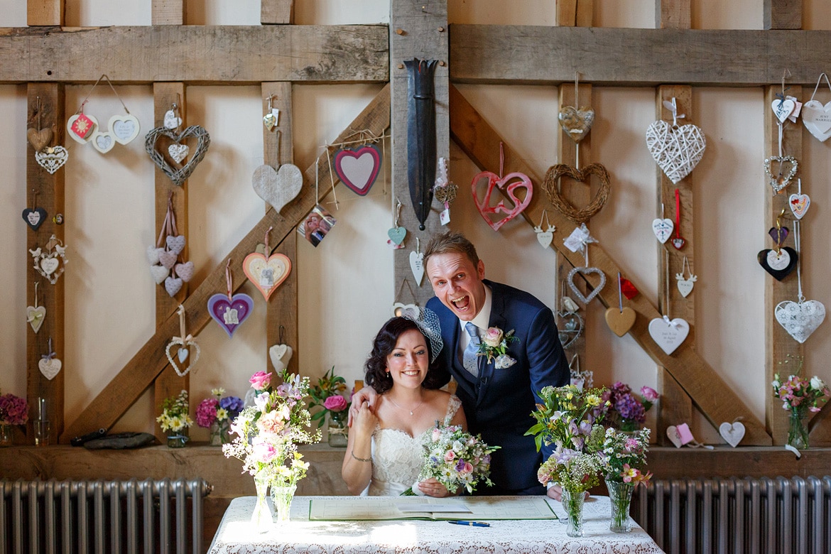 the happy couple with the register