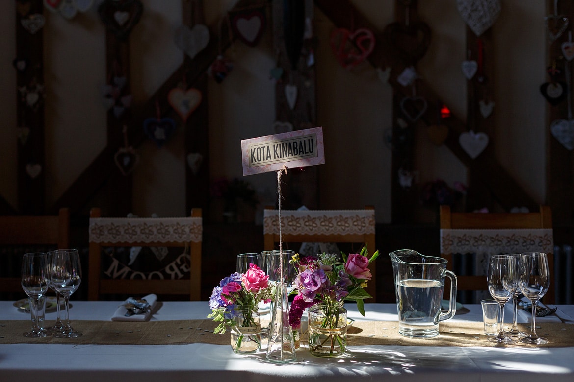 a table card in a shaft of sunlight