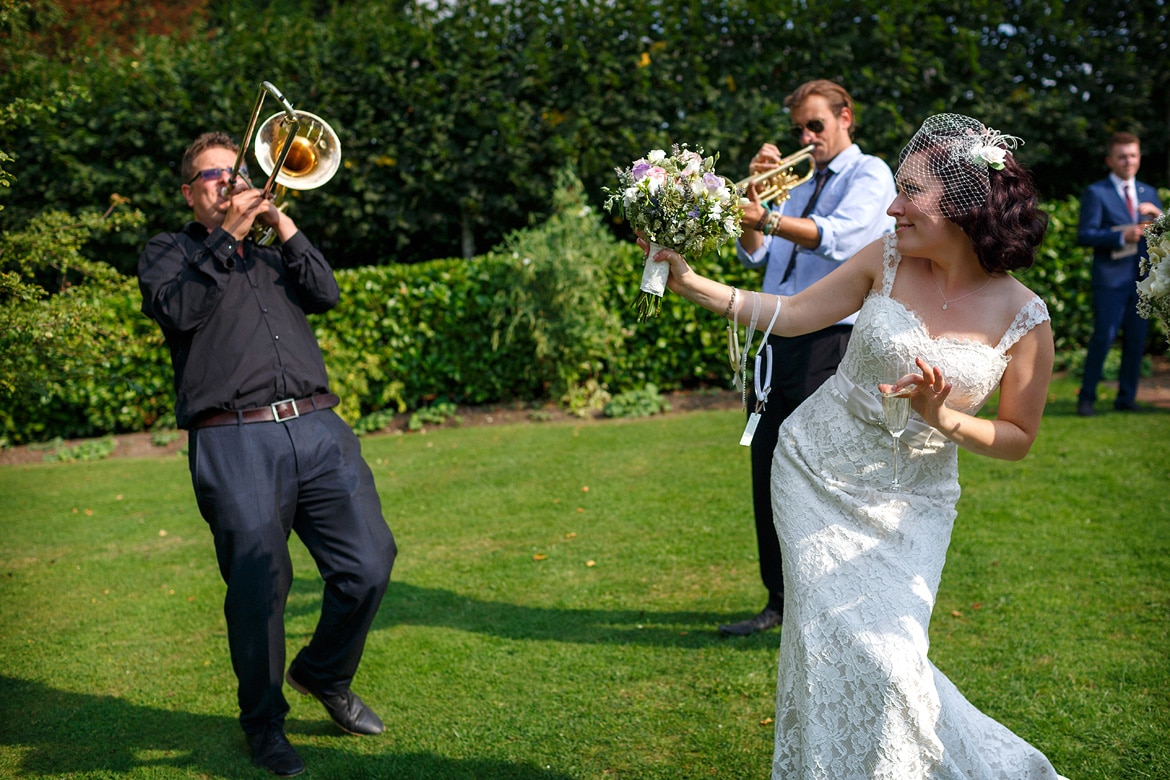 the bride dances with the band