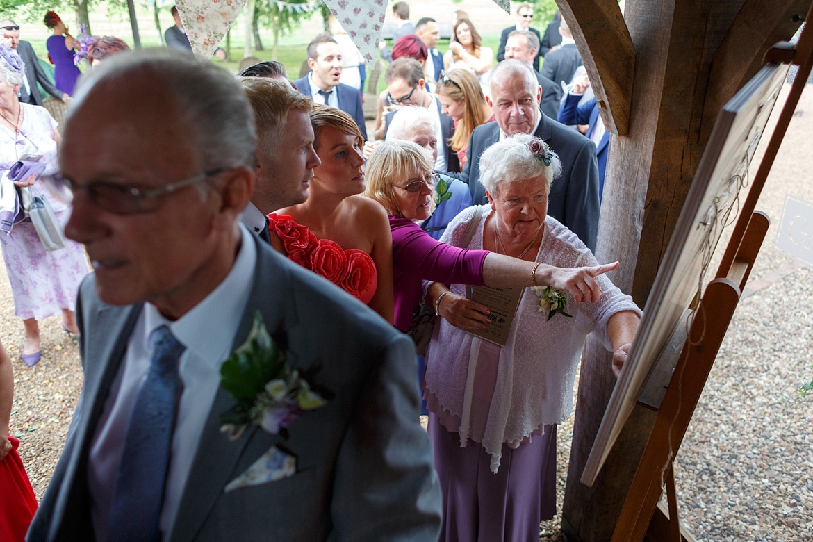 guests find their places on the table plan