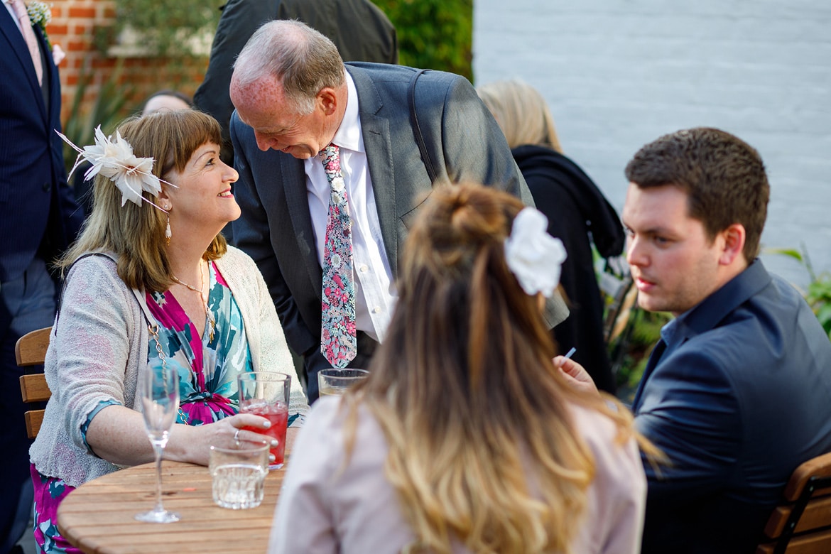 two guests exchange glances