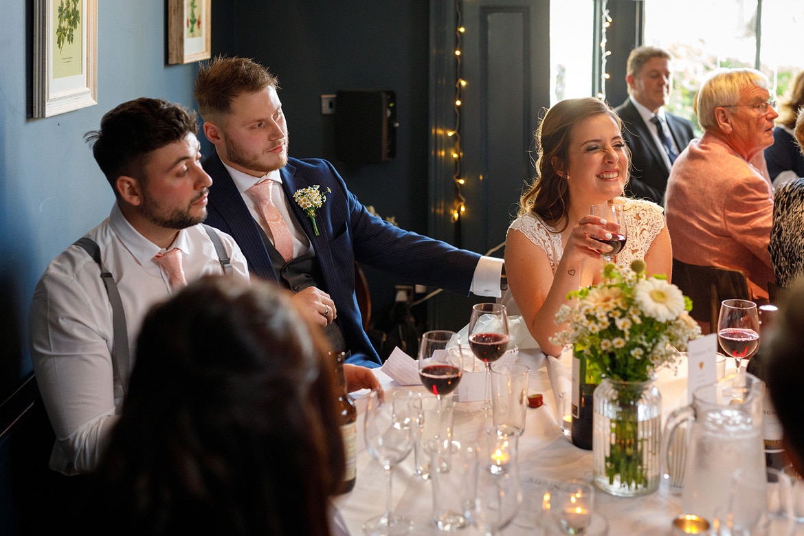 the bride listens to her brothers speech