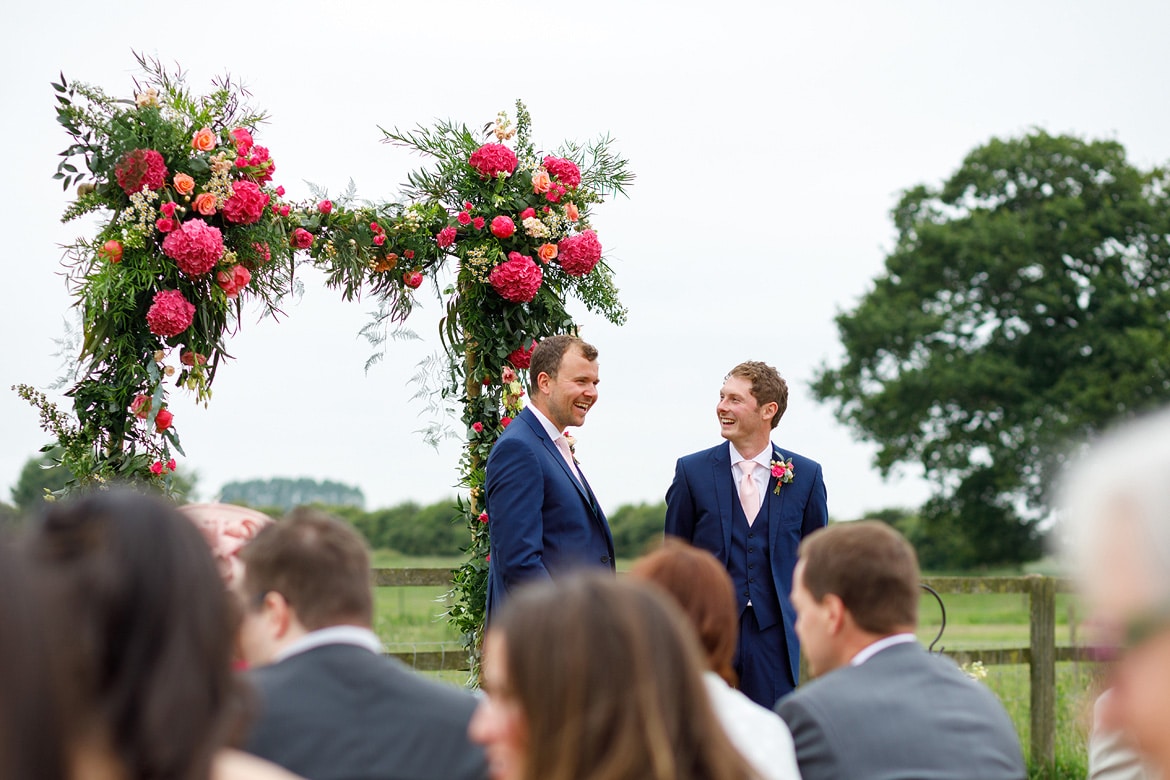 groom and best man enjoy a joke