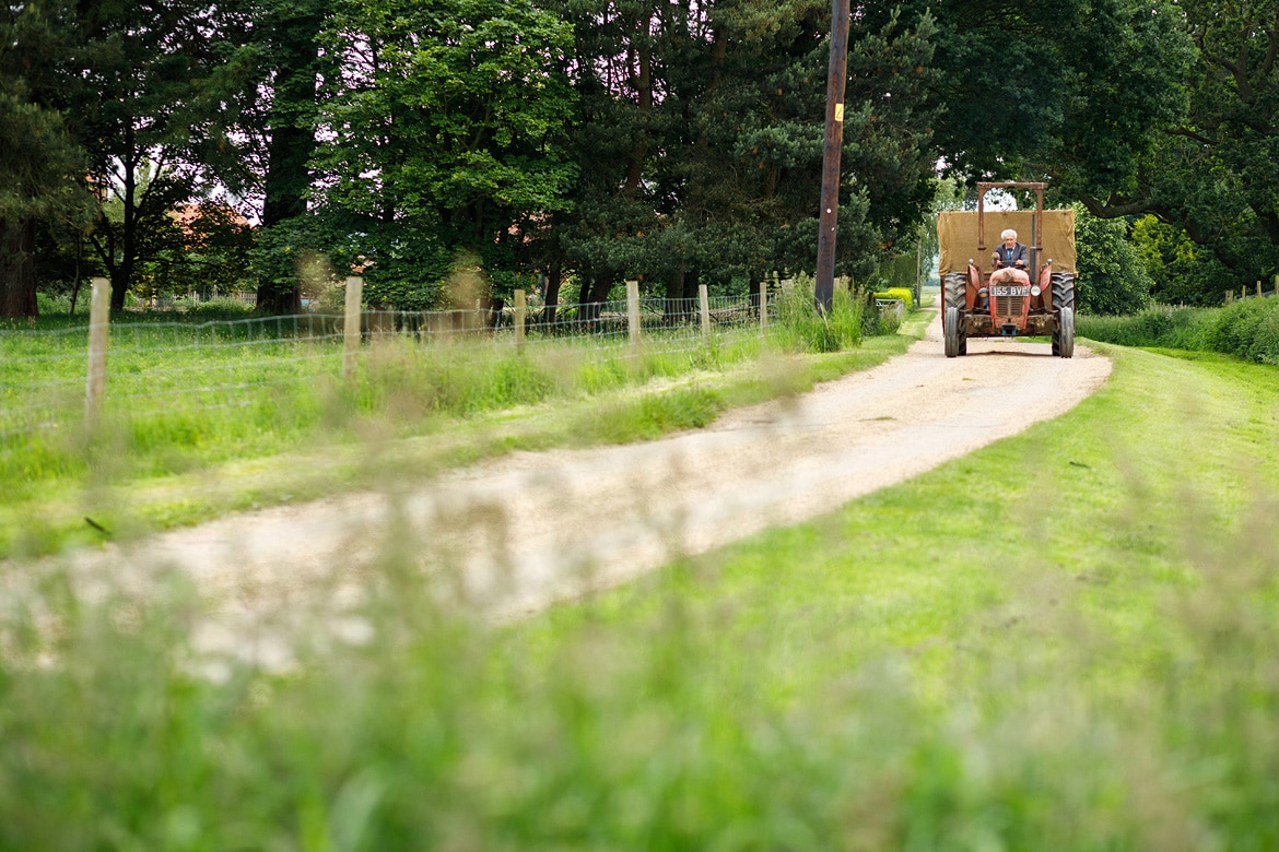 the tractor arrives with the bride