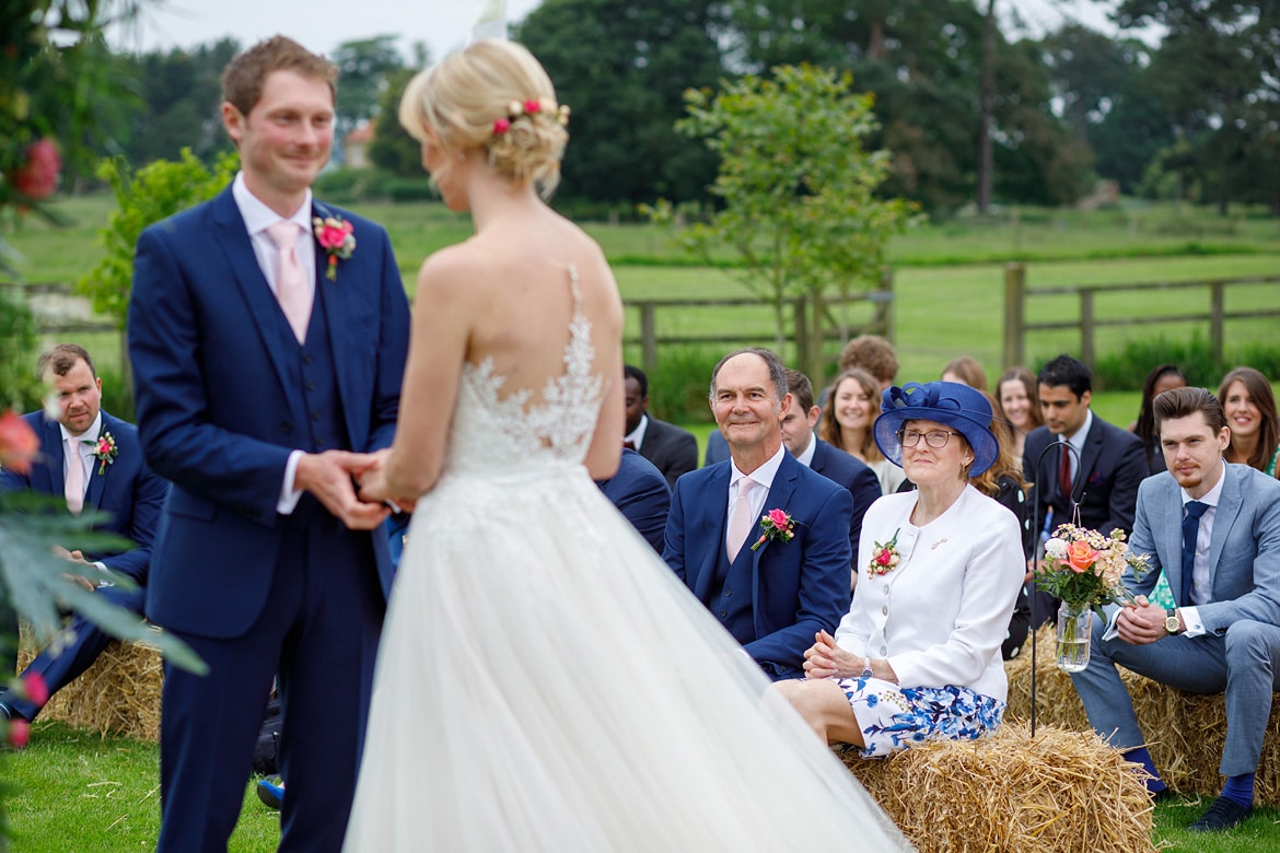 georges parents watch the wedding ceremony