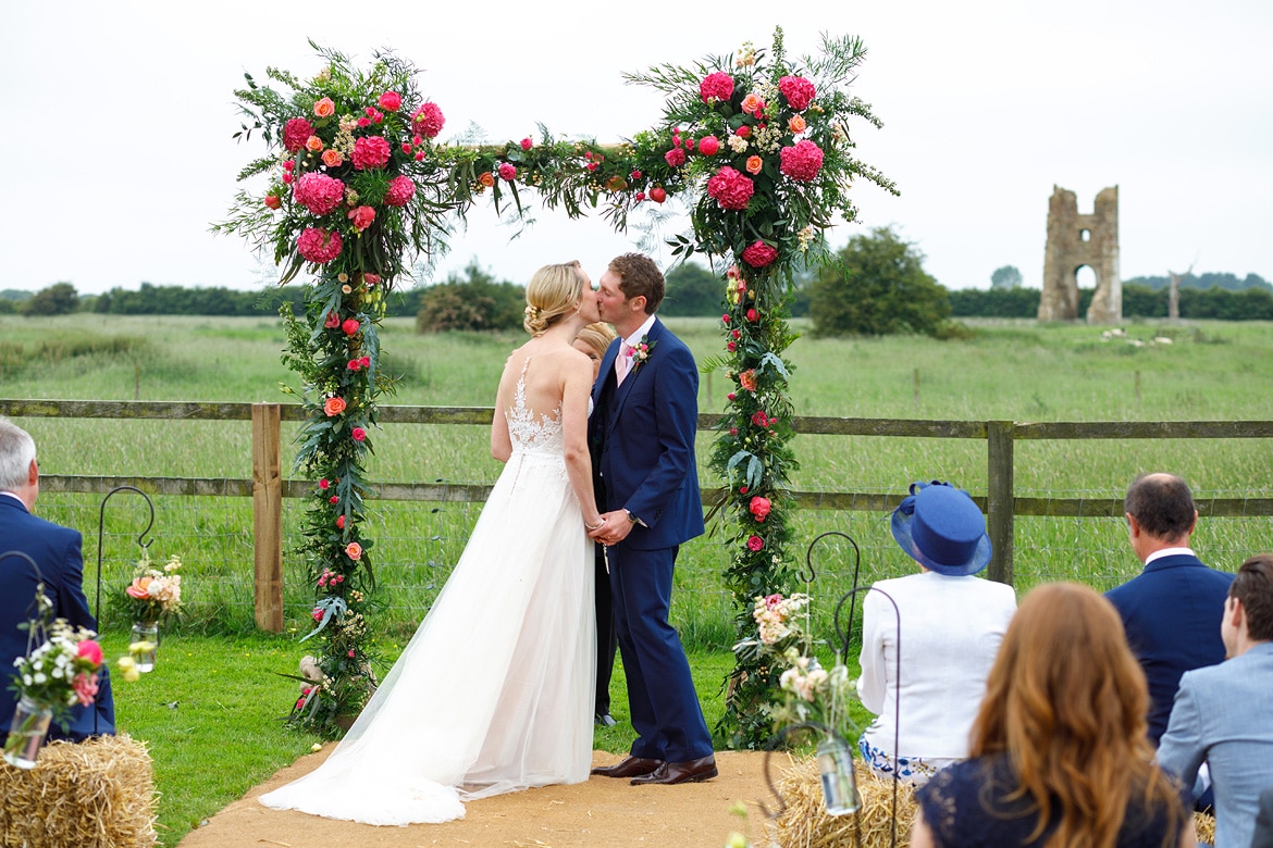 bride and groom kiss