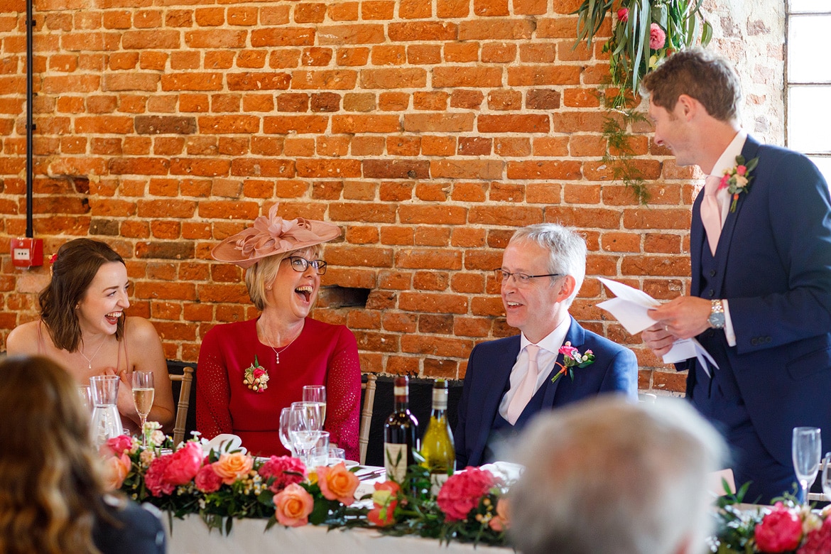 lauras mum laughs during the grooms speech