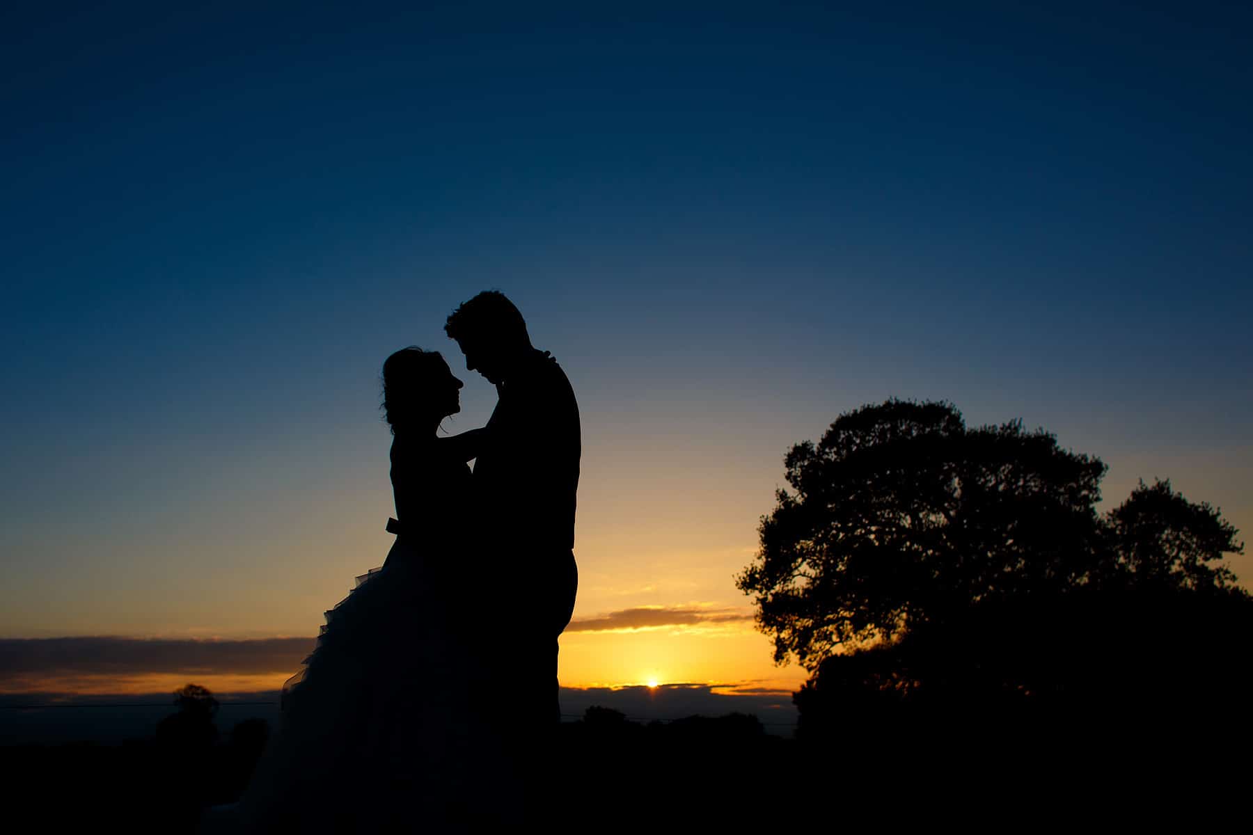 sunset silhouette in the ground of godwick hall