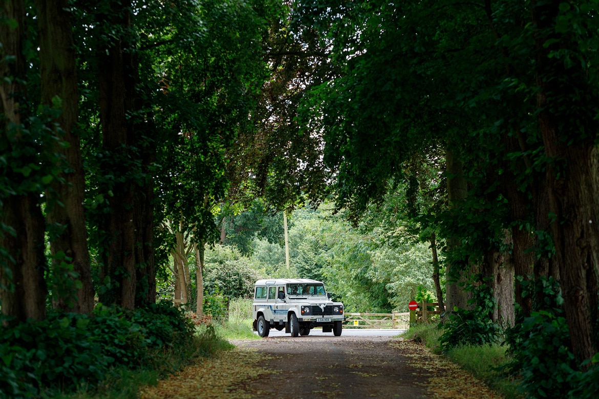 the bride arrives in her landrover discovery