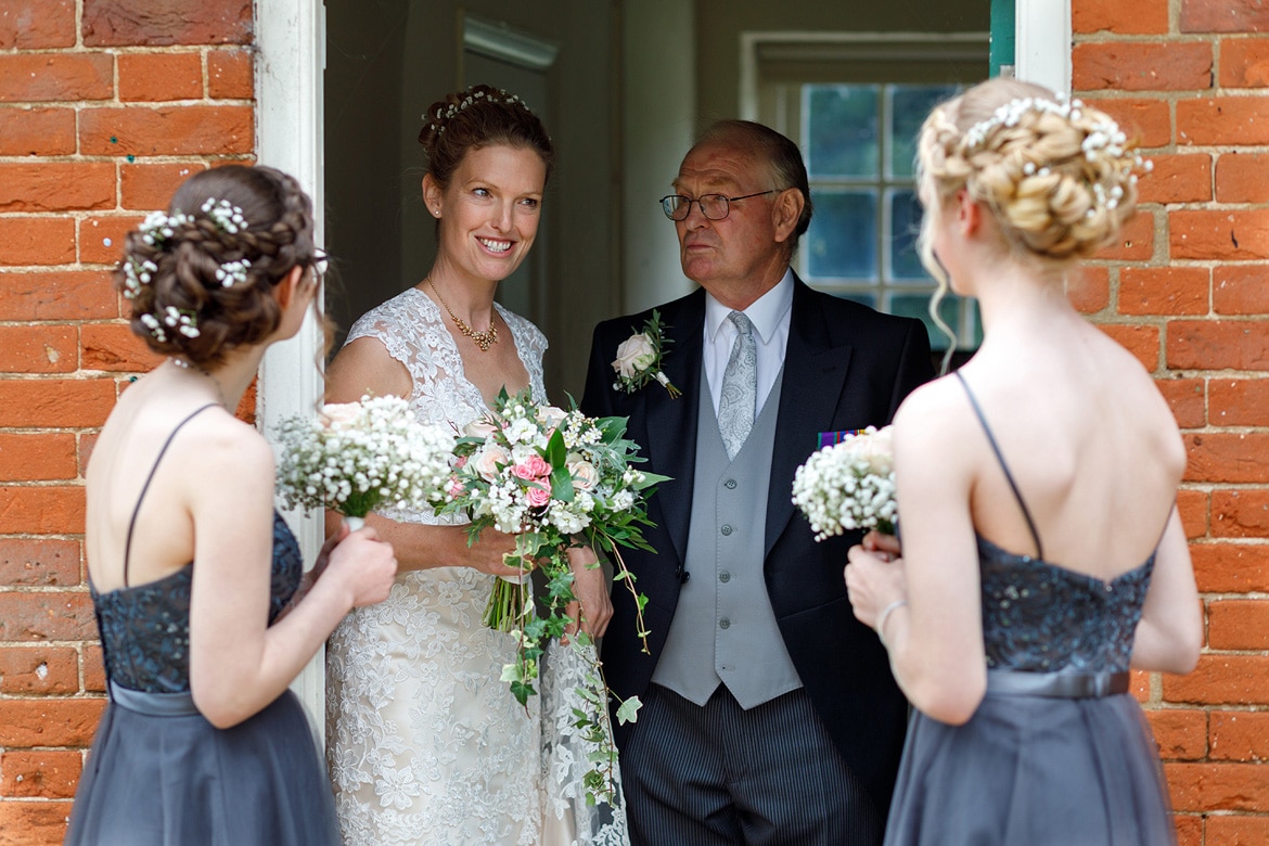 the bride and her wedding party before a gressenhall ceremony
