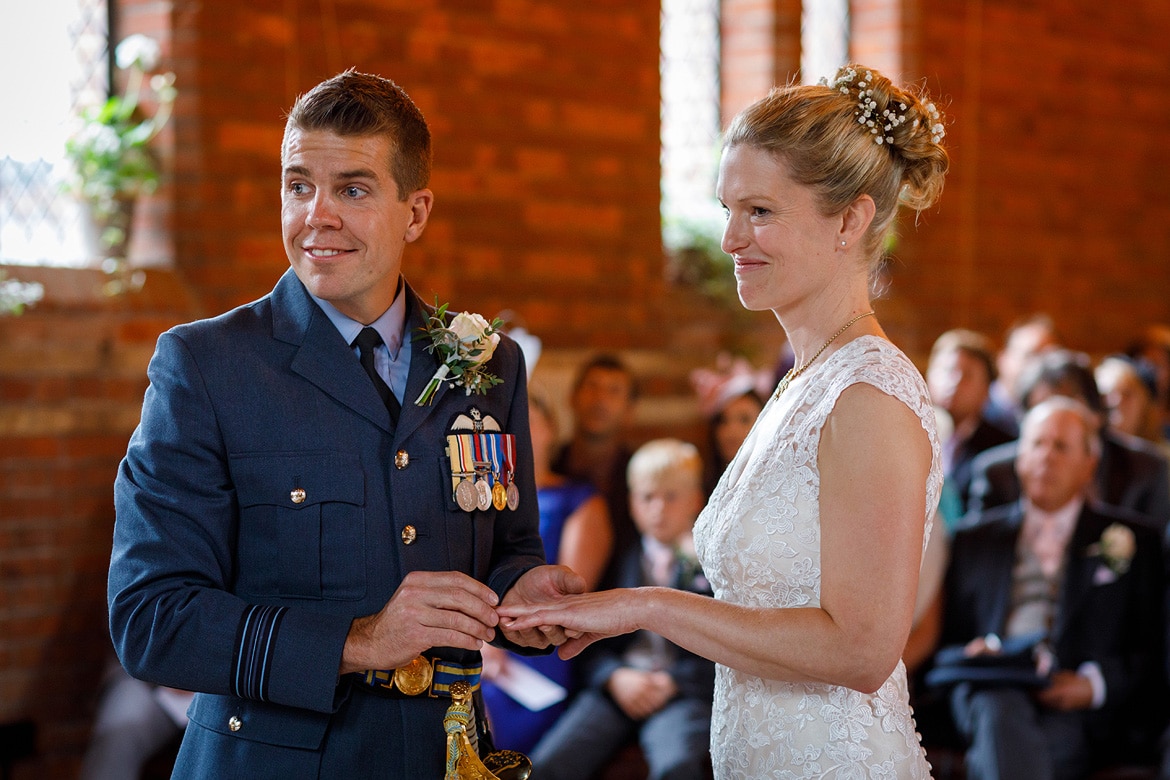 bride and groom exchange rings