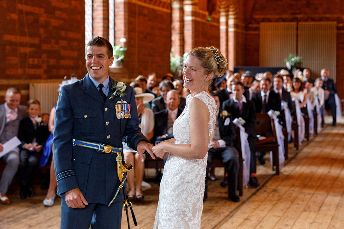 trixie and ben laugh during the ceremony