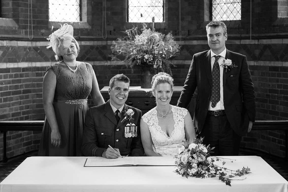 The wedding party at the front of the church