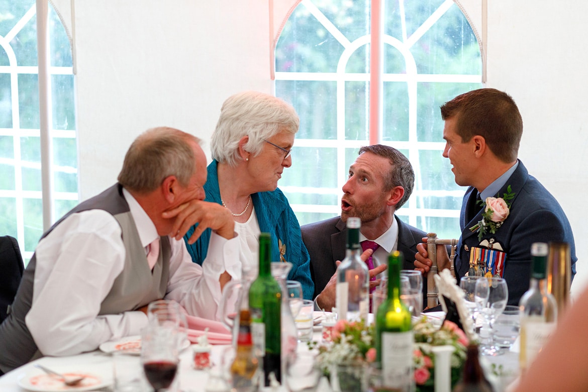 a guest talks to the brides mother