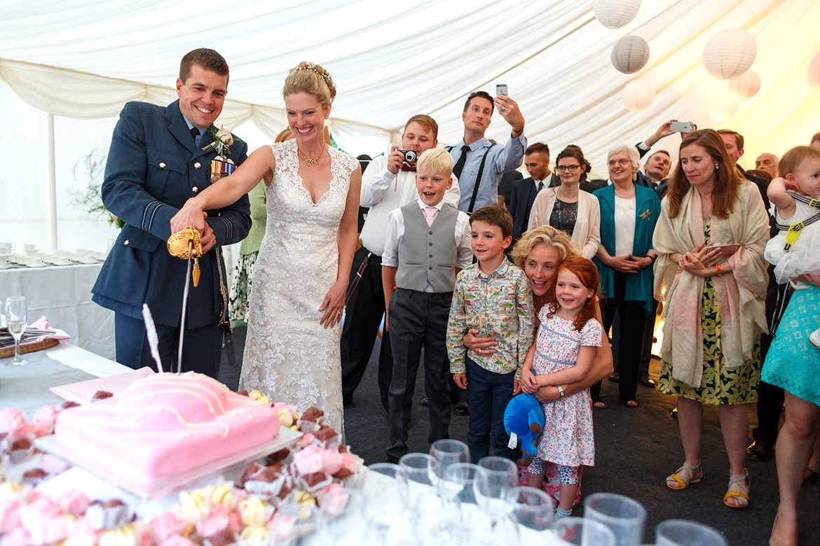 trixie and ben cut the cake