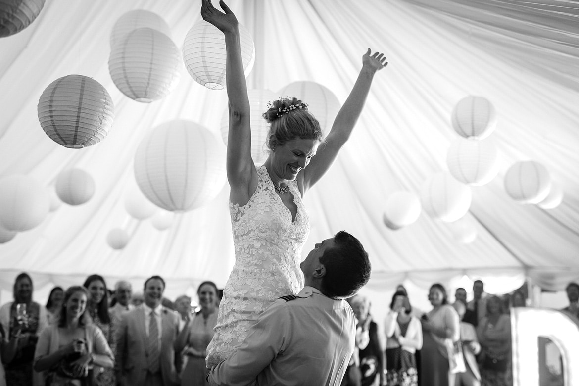 ben lifts trixie at the end of the first dance