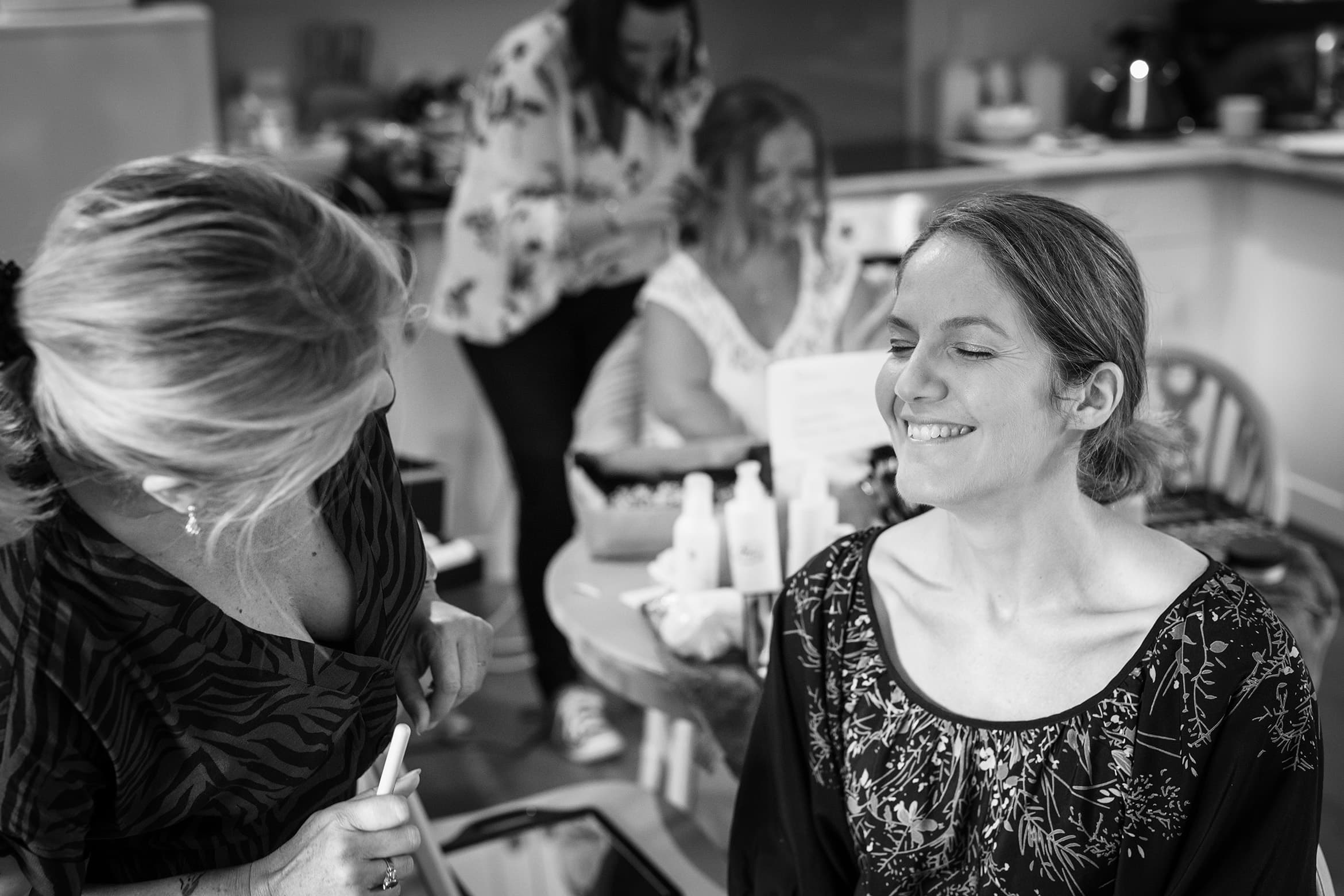 the brides sister having her makeup done