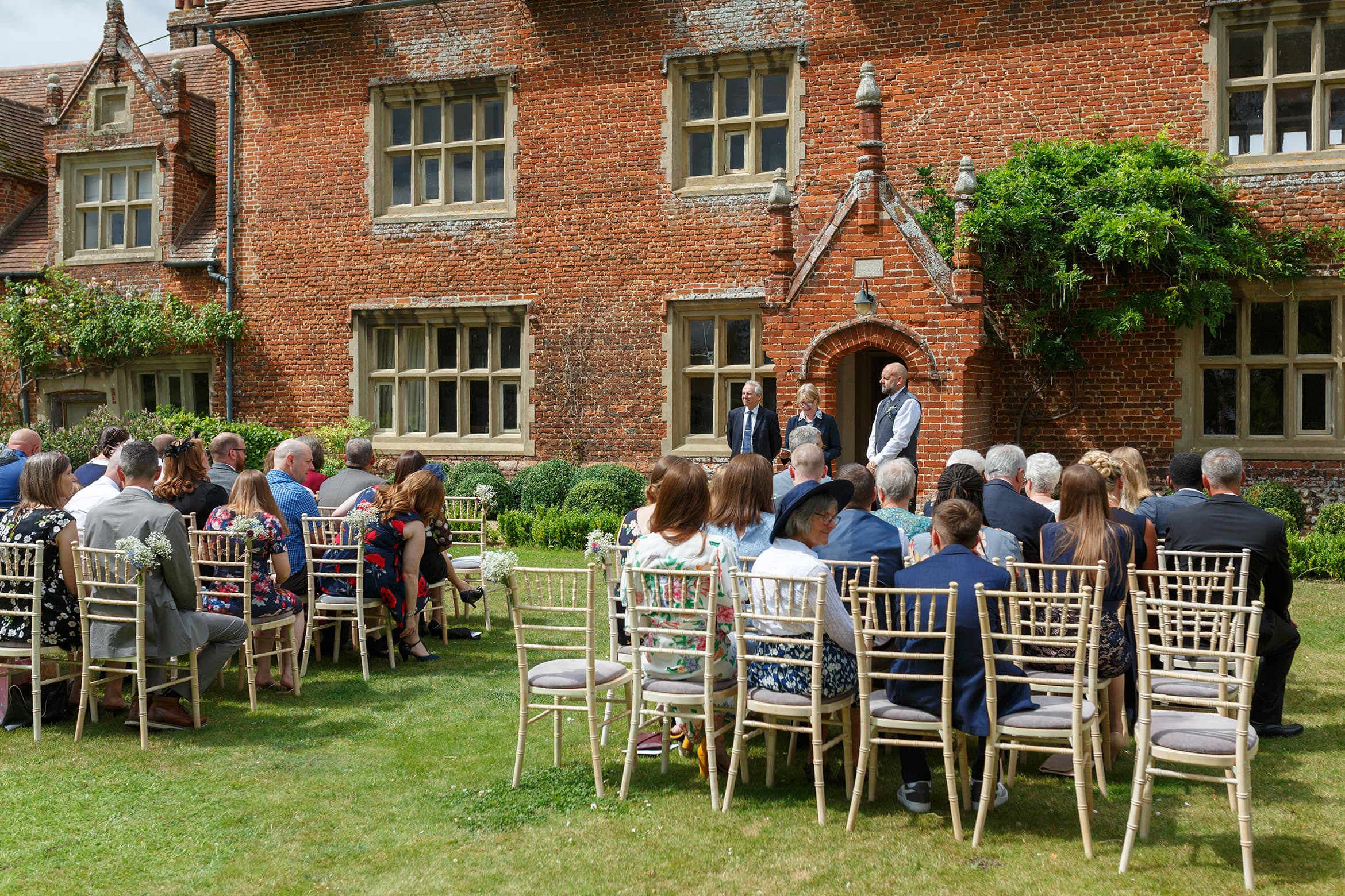 the groom waits in front of hautbois hall